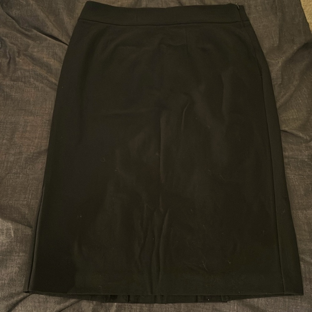 Formal skirt, black, 25 long, 17 wide, 65% Polyester, 31% Rayon, 4% Spandex